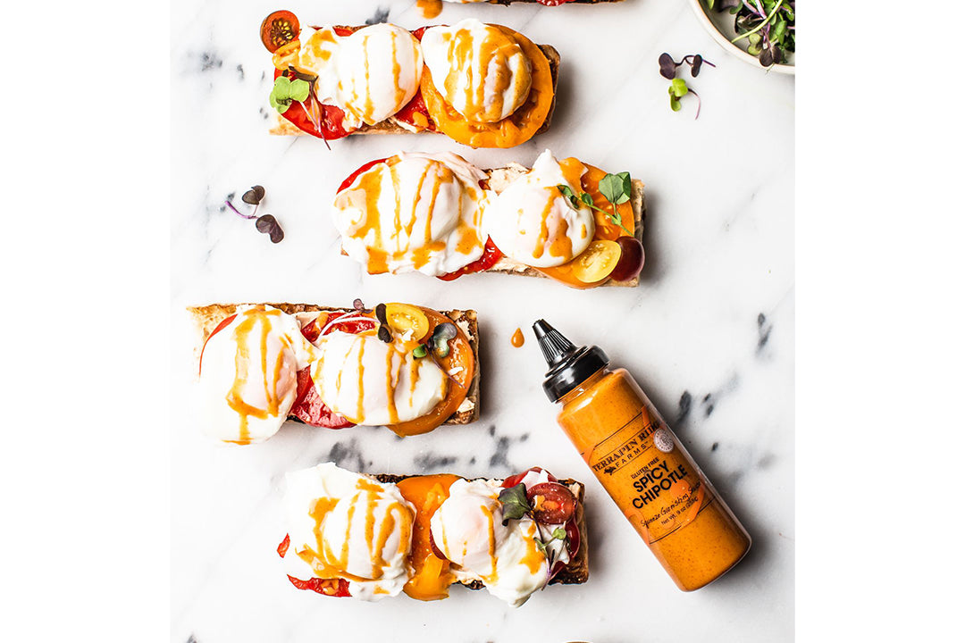 Chipotle Eggs Benedict with Goat Cheese Spread on a french baguette with Terrapin Ridge Farms Spicy Chipotle Chipotle Eggs Benedict with Goat Cheese Spread on a french baguette with Terrapin Ridge Farms Spicy Chipotle